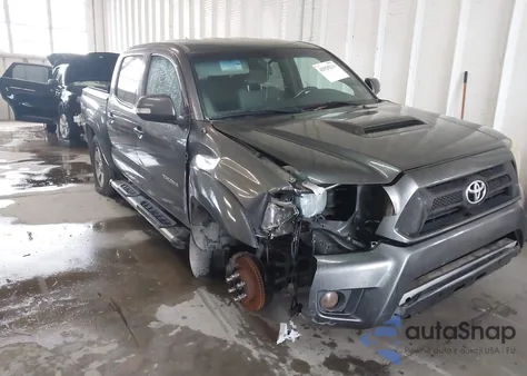 2015 Toyota Tacoma Base V6 z USA, uszkodzony, nr VIN 5TFLU4EN4FX118128